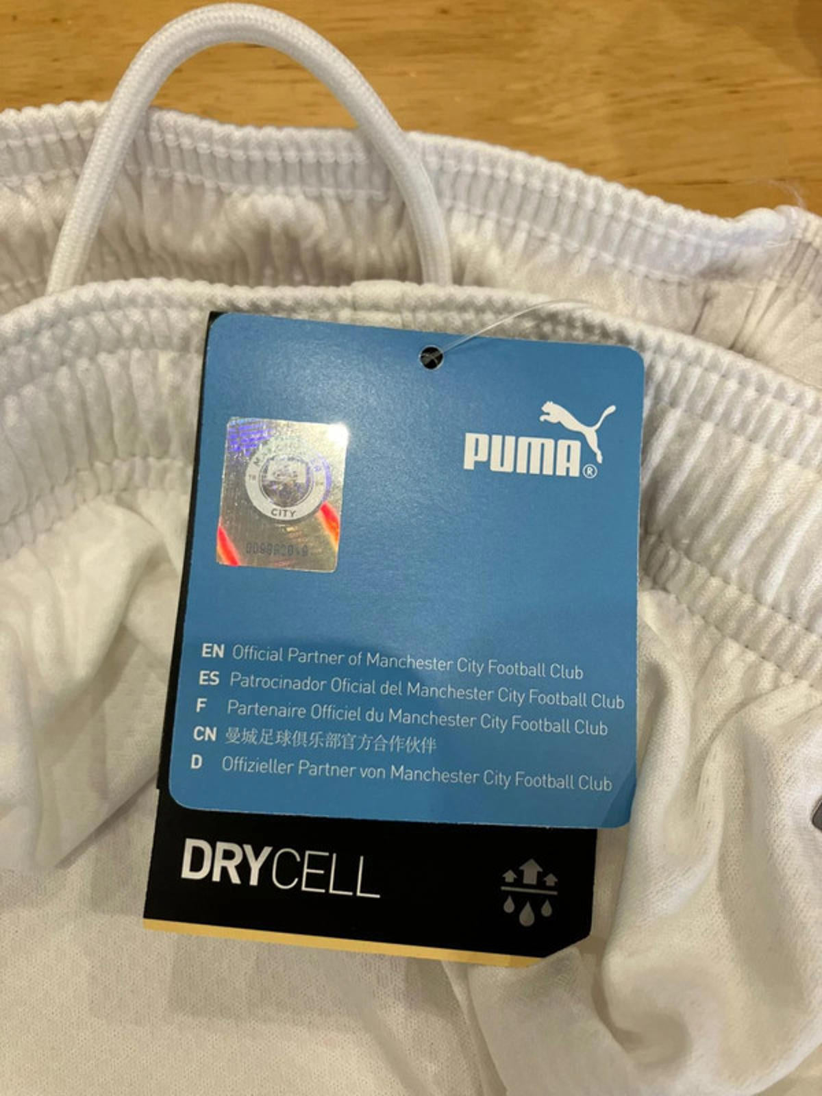 Puma Manchester City Football Club DryCELL Shorts - White & Viola Purple, UK size junior age 15-16