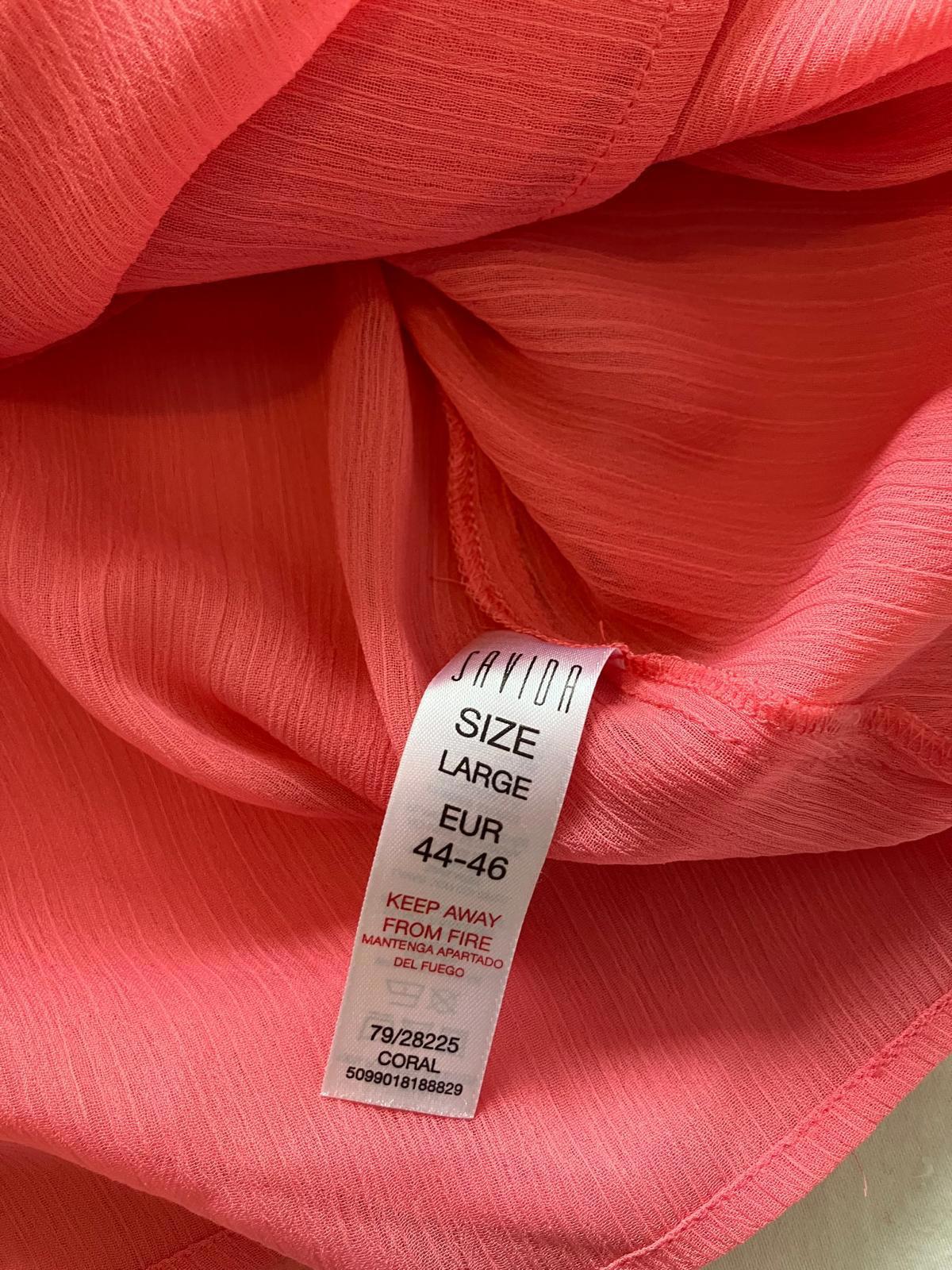 Charming Coral Pink Bow Tie Blouse with Floral Sleeve Detail