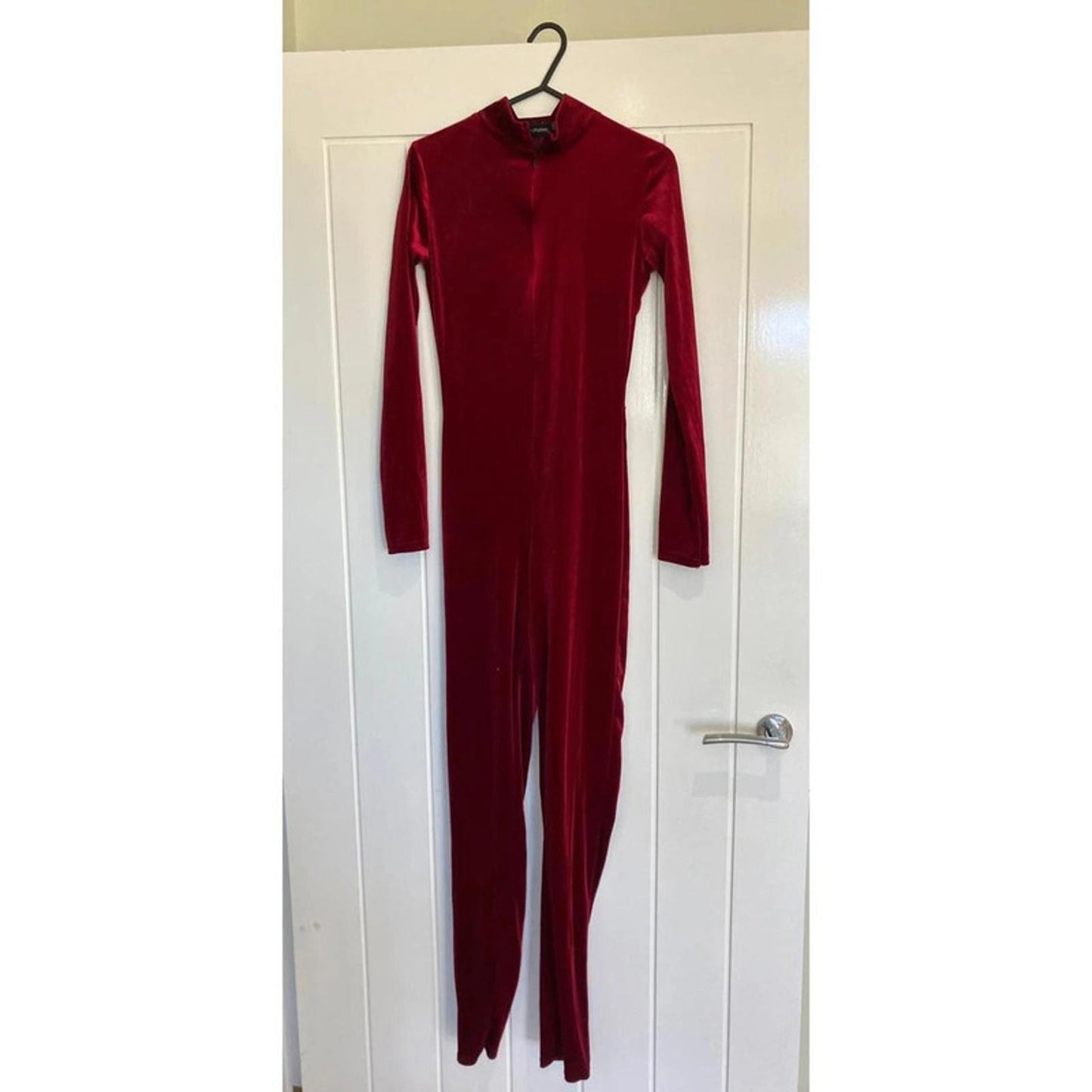 Striking red velvet jumpsuit from PrettyLittleThing, size UK 6.