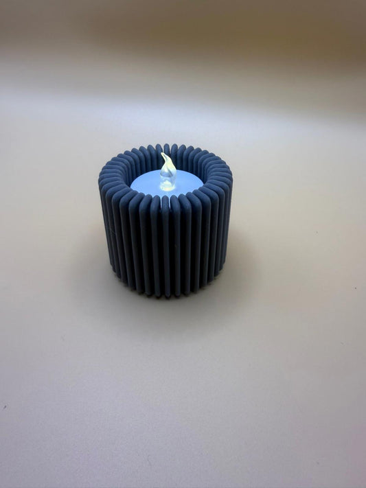 Modern Blue Decorative Candle with Unique Ribbed Design